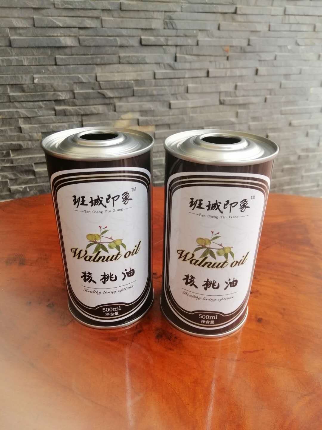 核桃油鐵罐包裝規(guī)格尺寸 250毫升核桃油價格  500毫升核桃油鐵罐設計